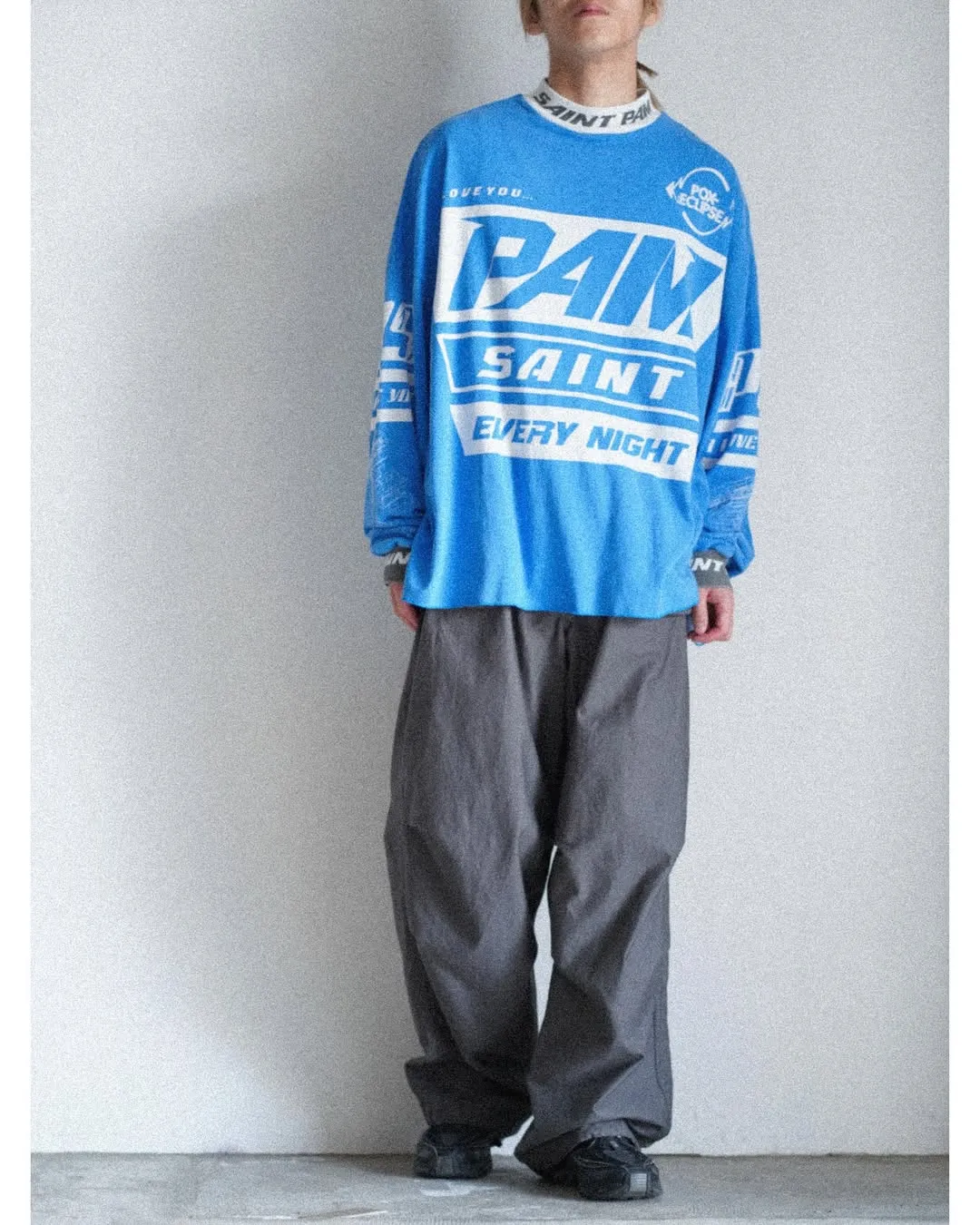 SAINT Mxxxxx Make the printing look distressed and white. Correct accessories. Customized co-branded model with P.A.M. wash mark.